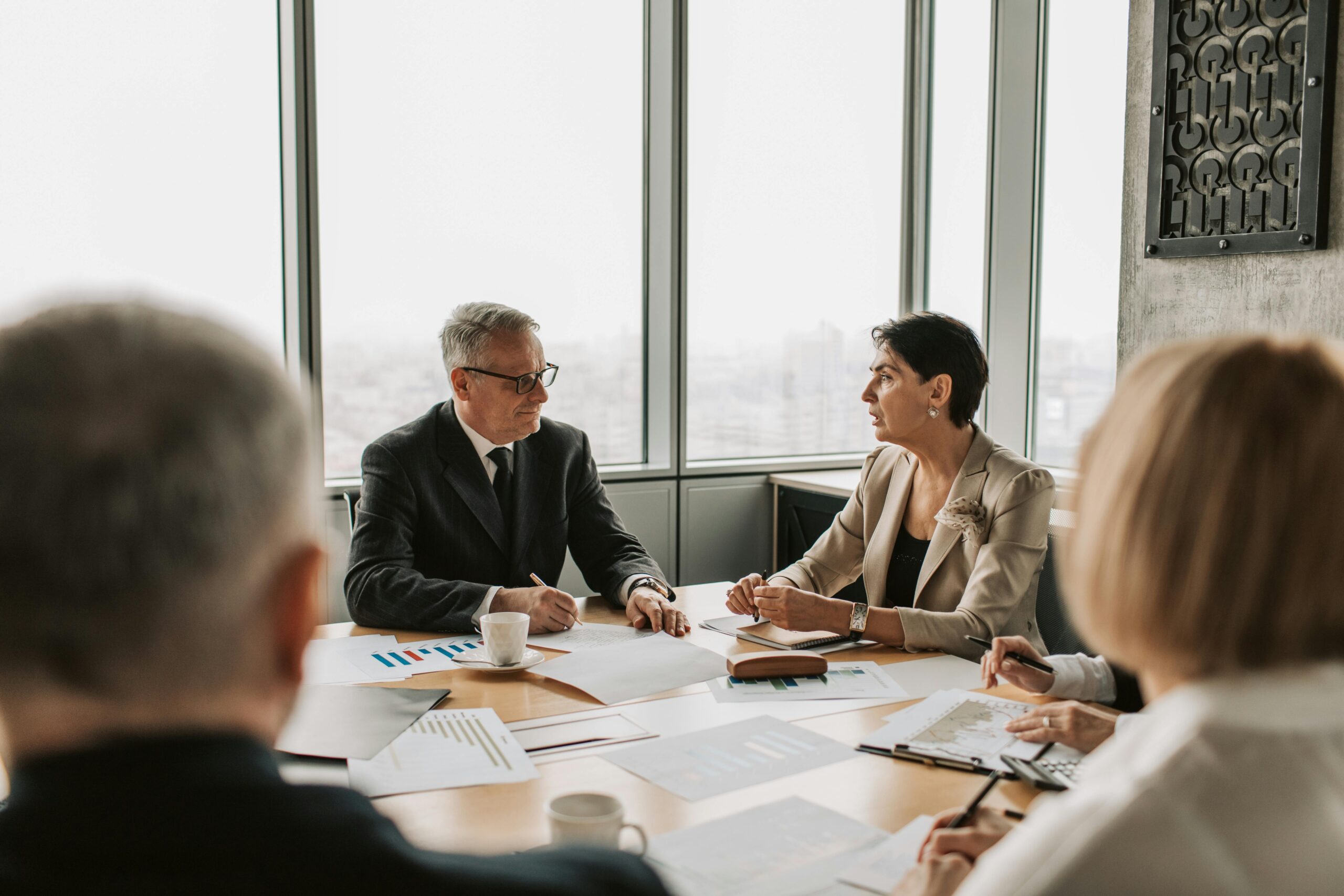 Employees in a meeting room of a Florida marketing company